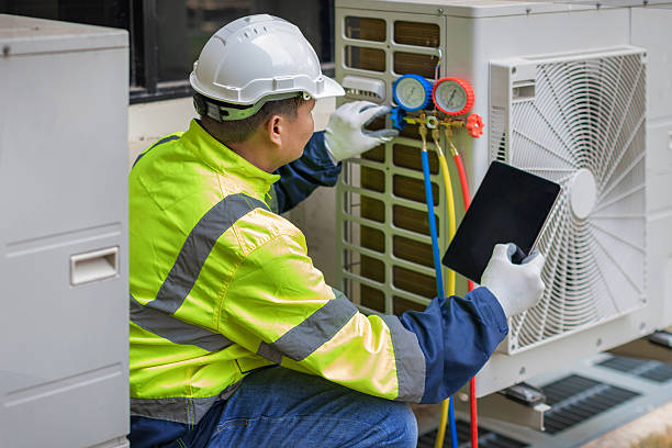 Professional Heat Pump Repair technician working in Exeter, RI